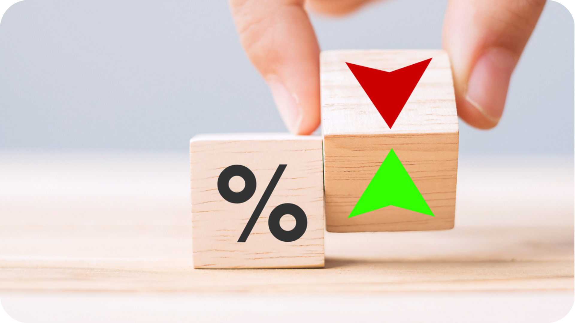 Summit Finance transformation shown by wooden building blocks with a % going from a negative to a positive %
