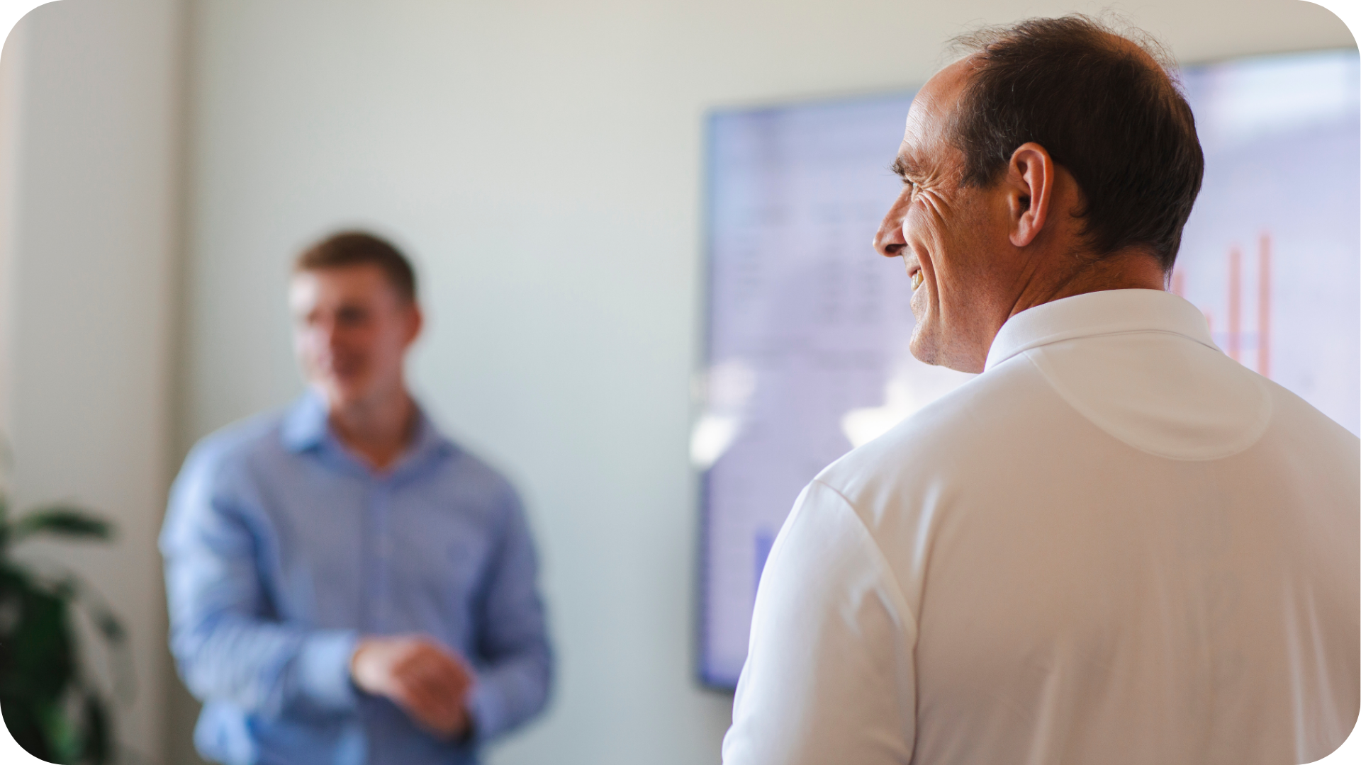 Fractional CFO Services for Startups shpwn by Craig and George in a business meeting